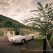 Bride stepping out of a classic Mercedes-Benz 190SL, surrounded by her bridesmaids at Euphoria Golf Estate, Limpopo.