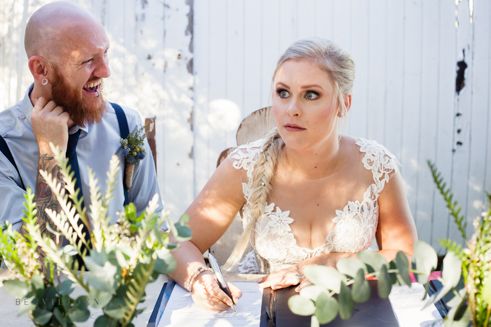 Pretoria wedding photographer captures bride’s shock and groom’s laughter during register signing