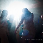 Colourful light burst over the dancefloor at a wedding reception in Johannesburg.