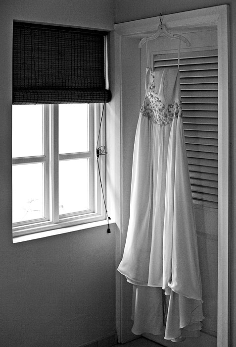 wedding dress at window